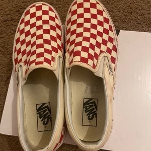Red & white slip on checkered Vans